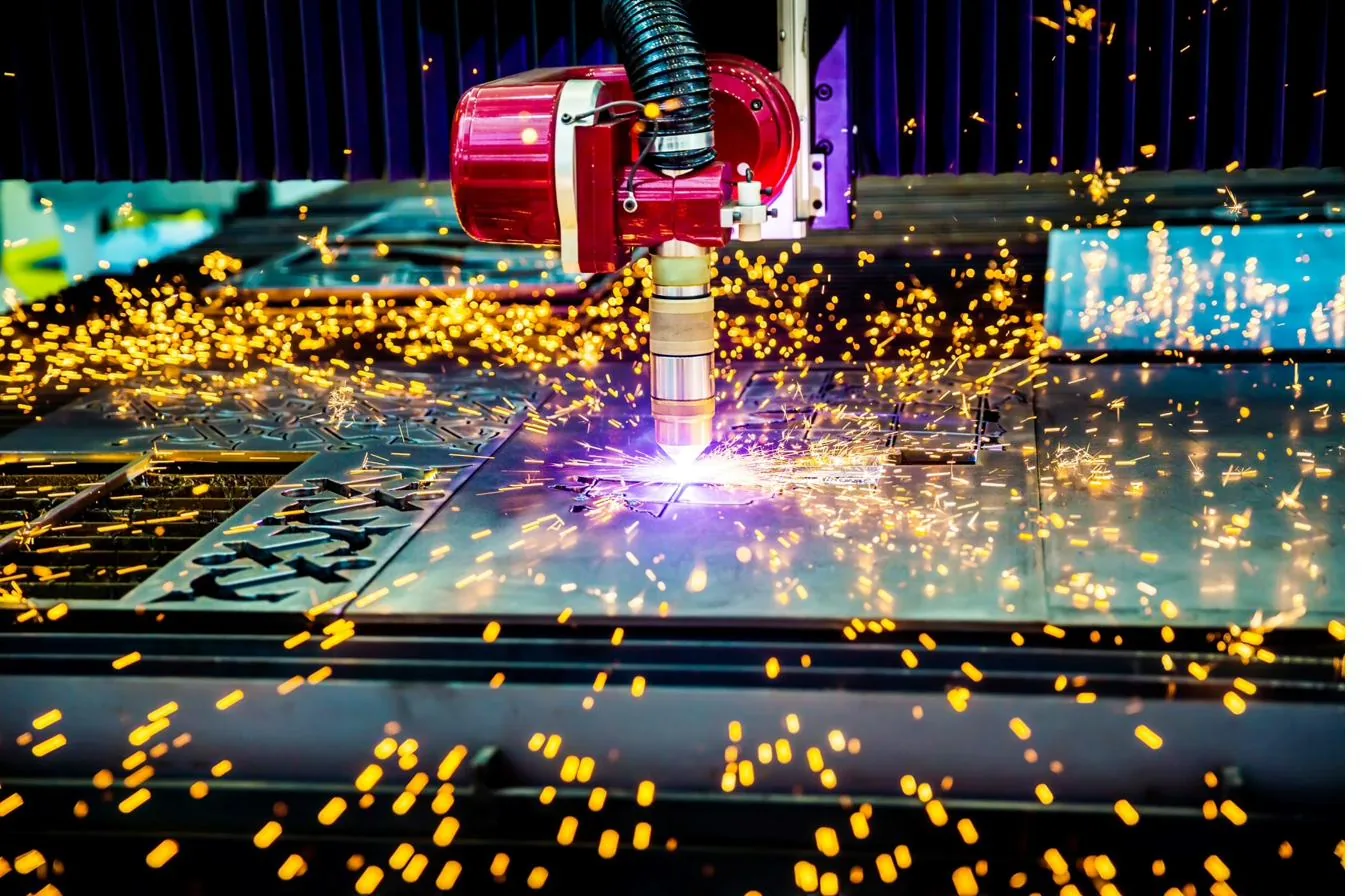 CNC machinist running a precision machining center